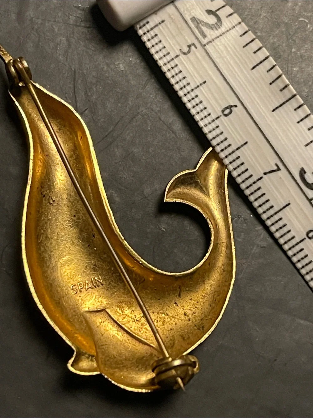 Ornate “Goldtone” and blackDolphin with silver Accent. Sculpture pin/brooch
